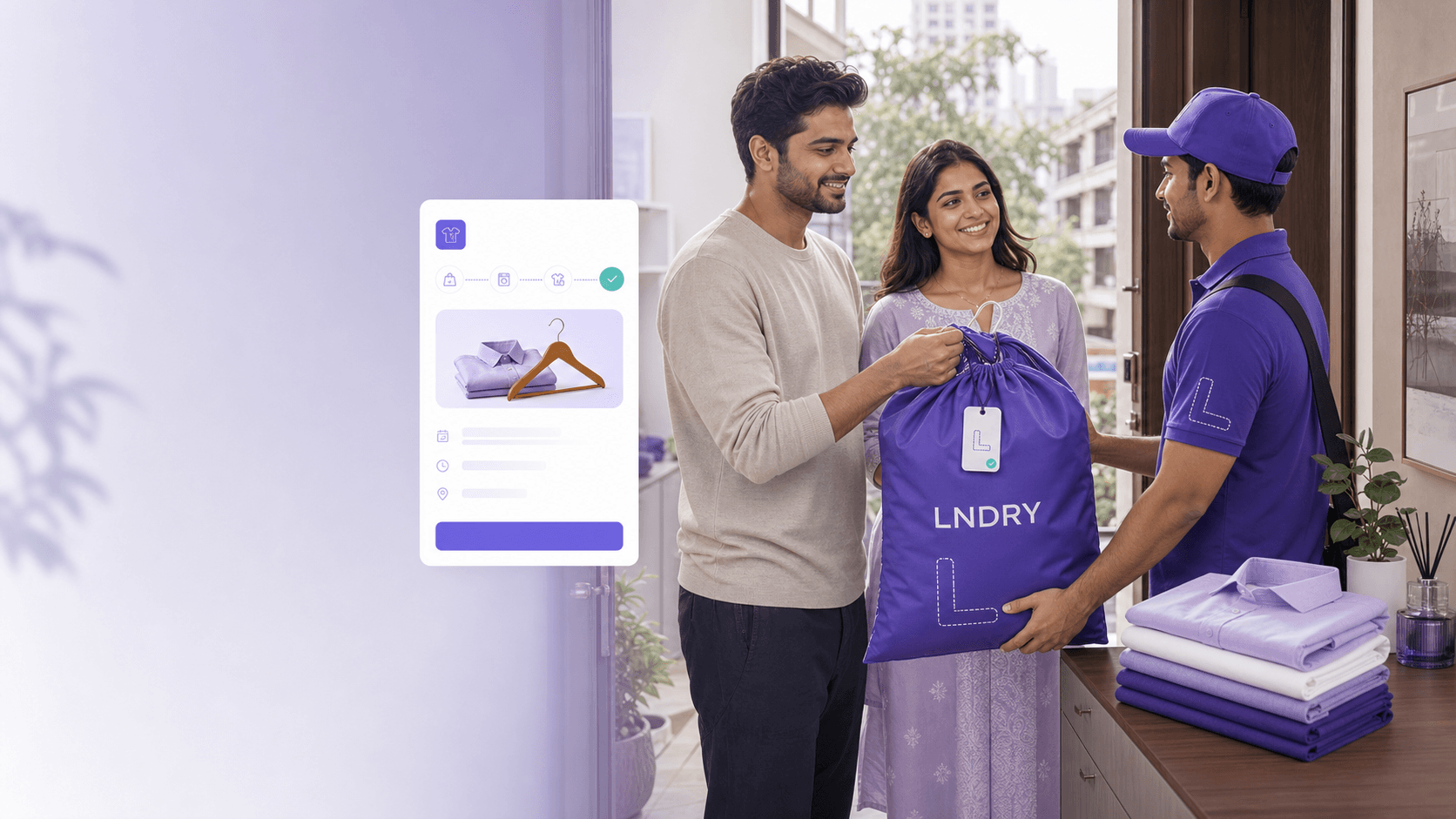 An LNDRY delivery partner handing a labeled garment bag to a couple at their doorstep